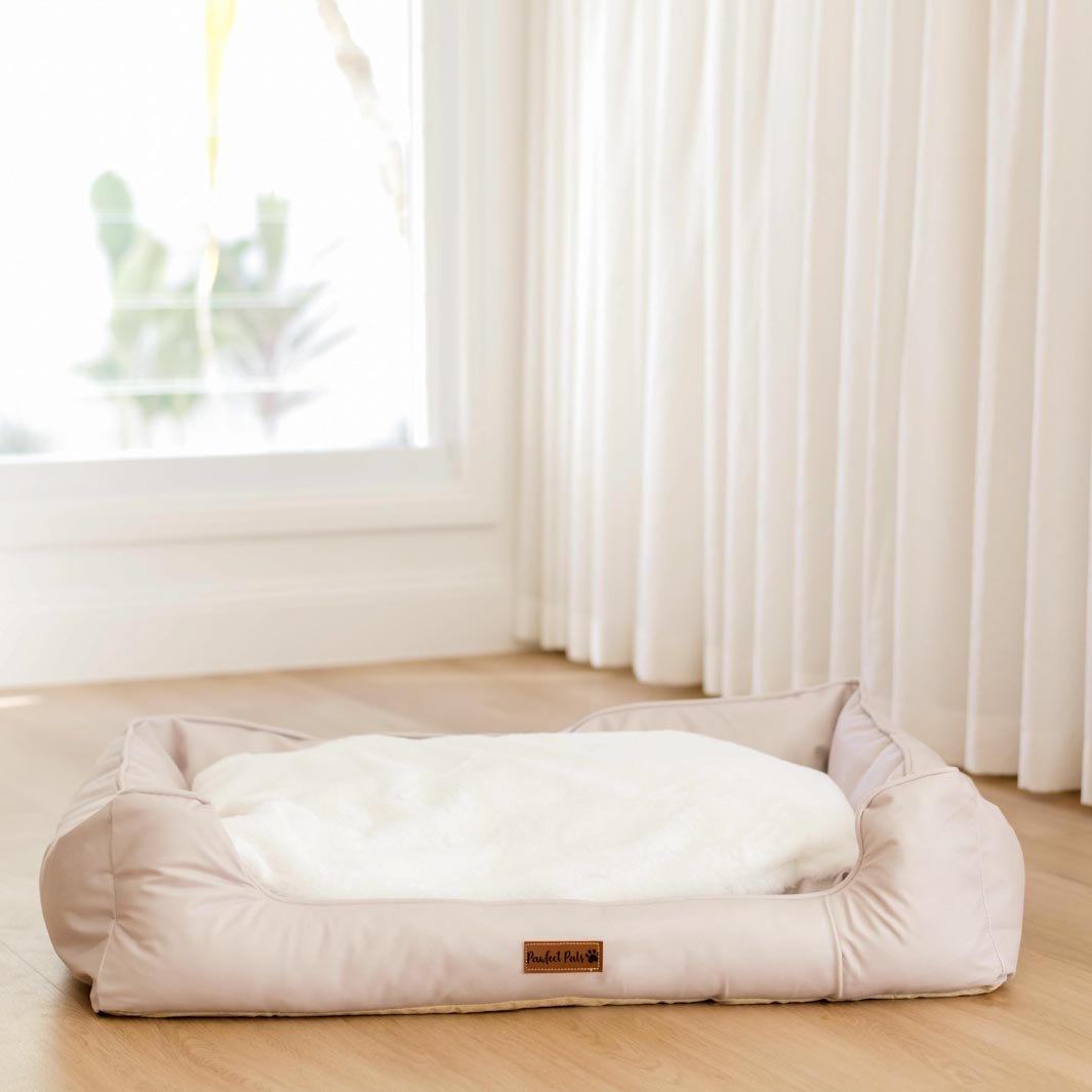 Underside of the Calm Biege Snuggle Bud dog bed.