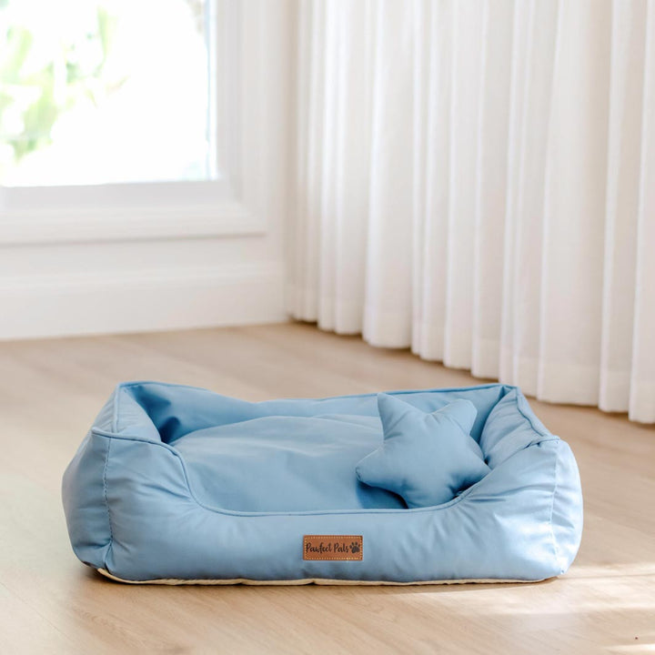 Dusty Blue Snuggle Bud dog bed.