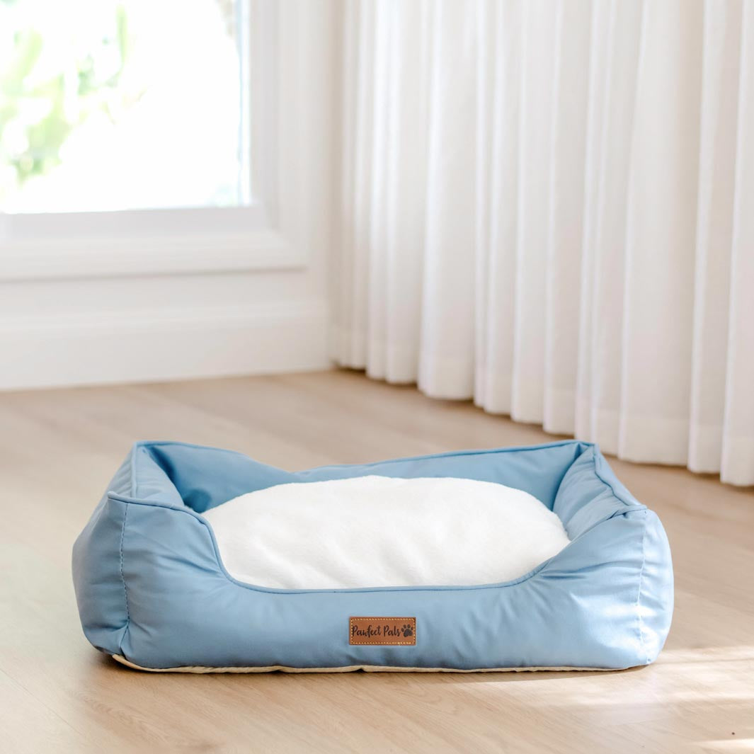 Underside of the Dusty Blue Snuggle Bud dog bed.