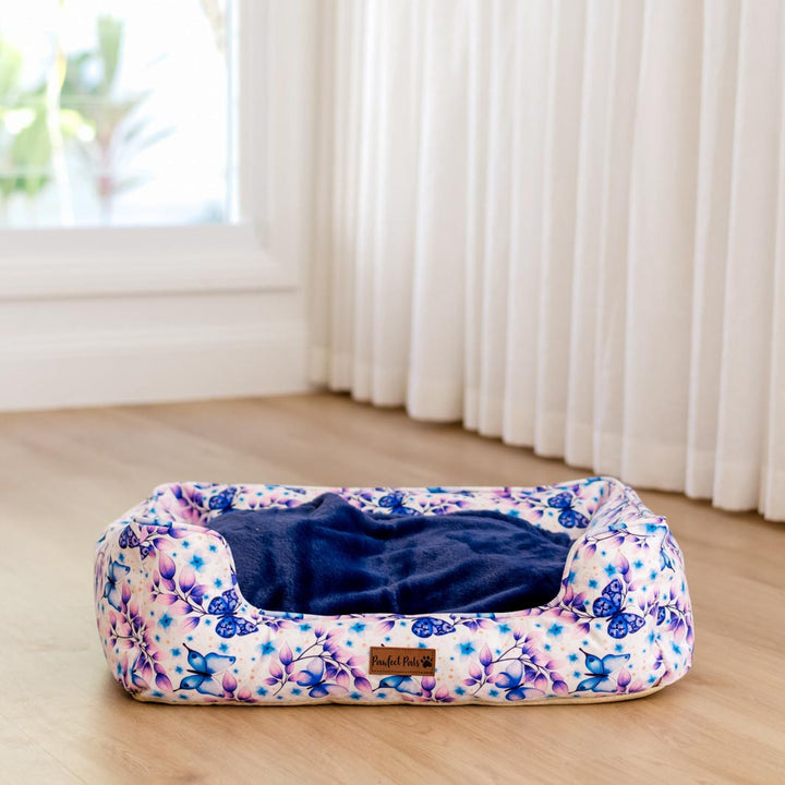 Underside of the Social Butterfly Snuggle Bud dog bed.